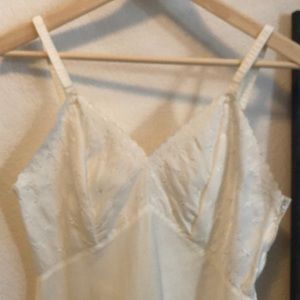 Vintage Creamy white Slip.  Sears              Size 36 Average gently used